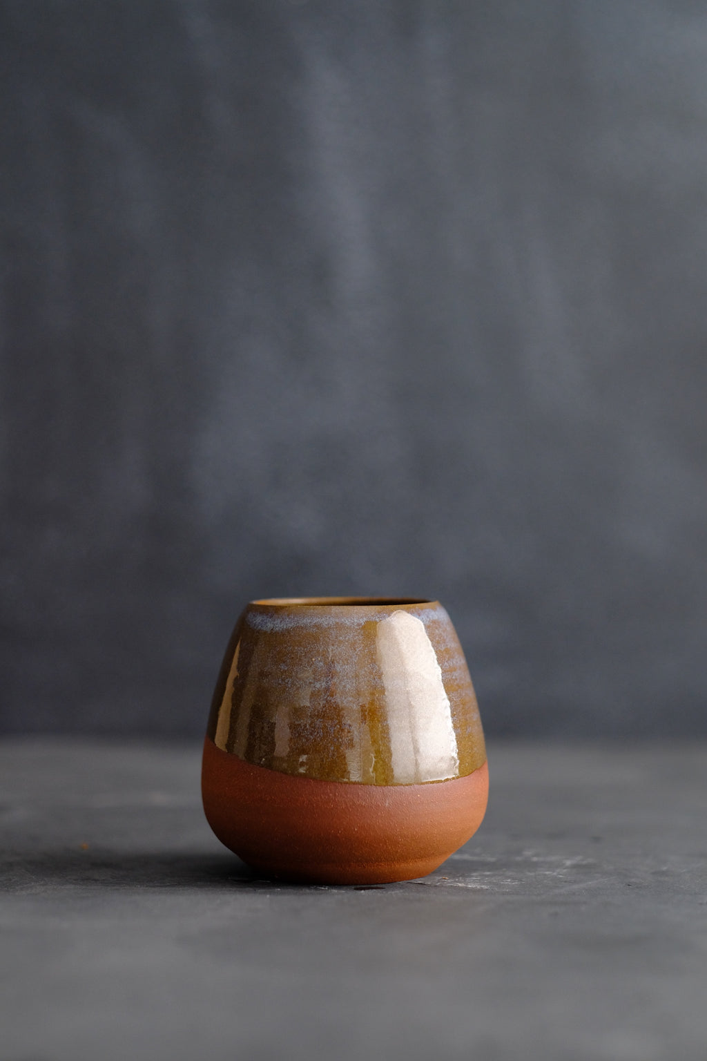 Rounded Warm Brown Clay Vase with Purple Glaze