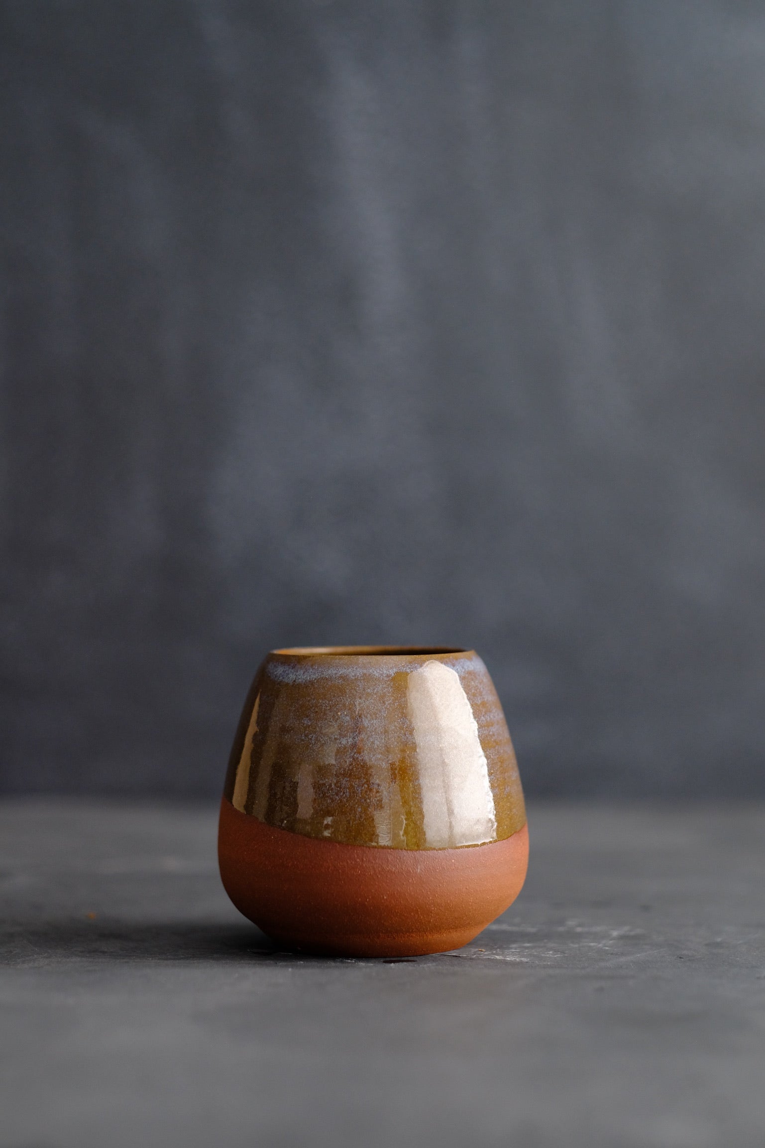 Rounded Warm Brown Clay Vase with Purple Glaze